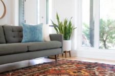 a colorful boho rug isn’t only a hot decor trend but also a way to sound proof your home