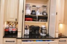 a large cabinet with shelves with appliances and drawers that hold appliances, too is a cool idea for making your kitchen more practical