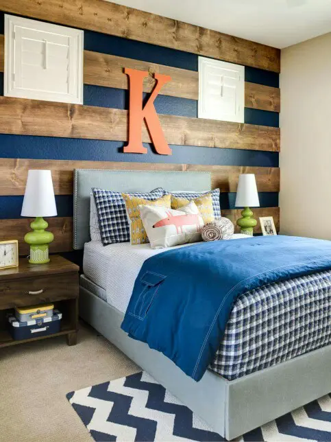To make a stylish accent wall paint it in some deep, bold color and cover with wood stripes.