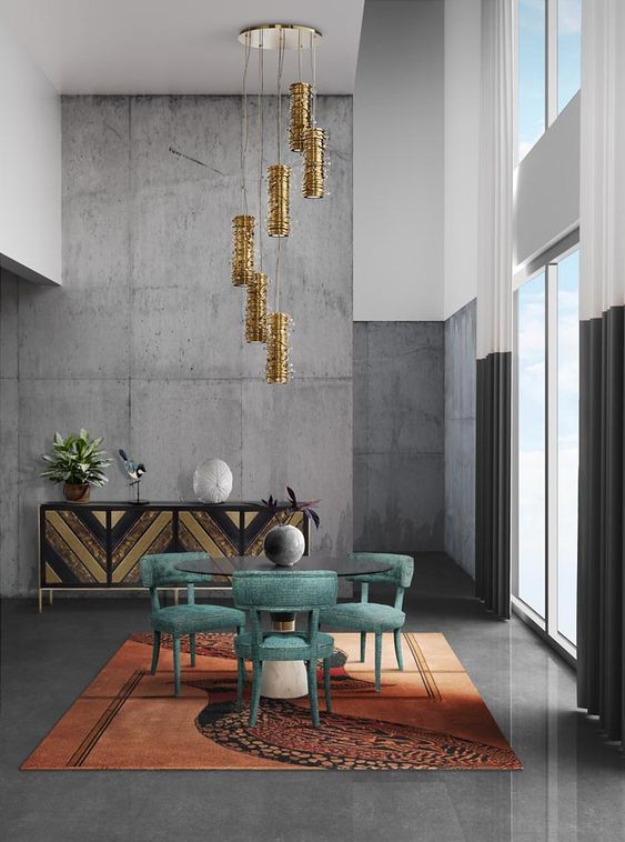 a rough concrete statement wall makes this colorful and refined space more contemporary and bold