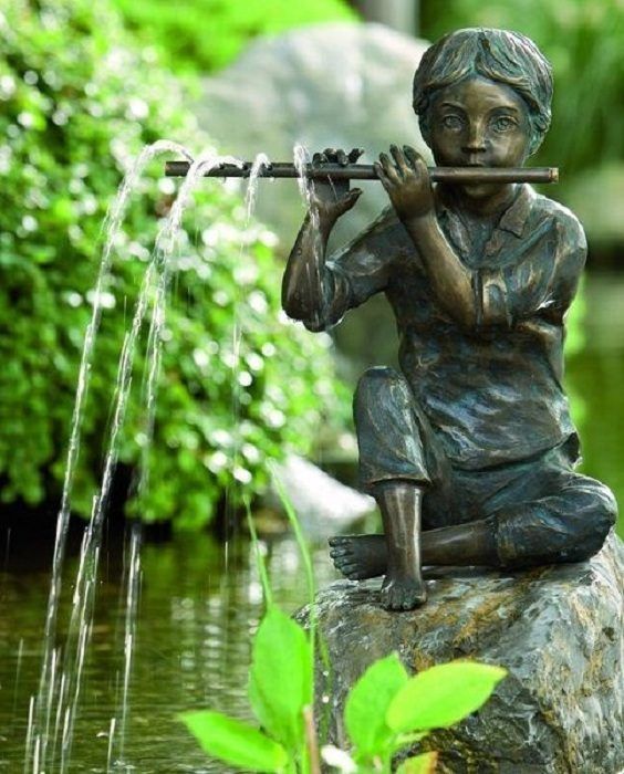 a super creative figure fountain like this one will be a whimsical idea for a fairy tale inspired garden