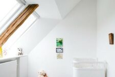 a minimal attic nursery design