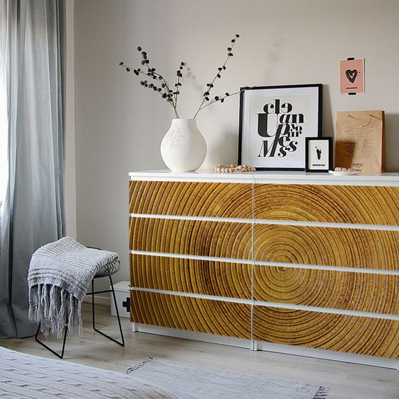 IKEA Malm dresser hack with gorgeous wood imitating stickers that add texture and structure to the space