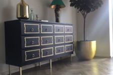 IKEA Malm hack in navy, with yellow drawer trim, ring pulls and brass legs for a touch of vintage elegance