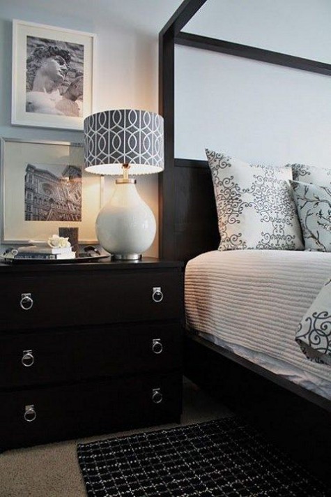 a black Malm dresser with pretty ring pulls is a chic nightstand for a bedroom