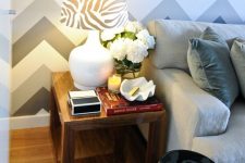a catchy IKEA Lack table hack with dark stain timber panels is a lovely idea for adding an elegant and warm rustic feel to the space