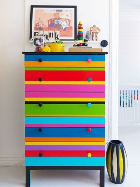 colorful striped Tarva dresser hack with bold knobs is a fun and whimsy piece, ideal for a kid's room