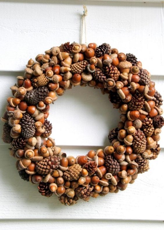 A cool natural fall wreath of acorns, nuts and pinecones is a timeless and long lasting idea to try