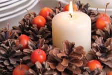 a chic fall centerpiece with pinecones