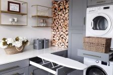 a practical laundry room with firewood storage