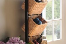 a shoe storage unit with several baskets is an elegant and cool unit for an entryway or closet