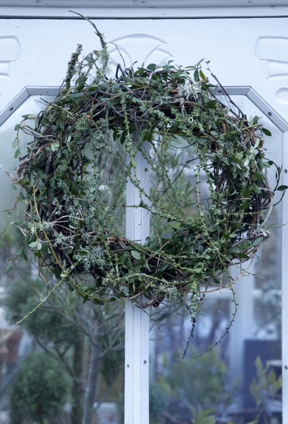 a textural woodland twig and greenery fall wreath with foliage will be a nice idea for both fall and summer