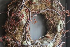 a woodland vien and twig fall wreath with moss and berries looks very forest-like and inspires
