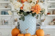 a lovely arrangement around a vase