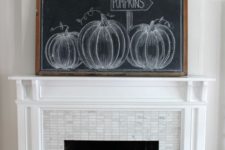 an oversized chalkboard pumpkin sign – chalk some pumpkins on it or whatever else you like