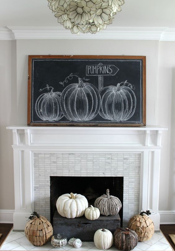 an oversized chalkboard pumpkin sign - chalk some pumpkins on it or whatever else you like
