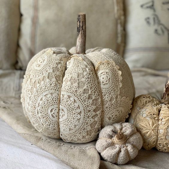neutral burlap and lace pumpkins with natural stems are amazing for decorating a shabby chic or vintage space