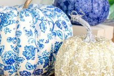 refined vintage-inspired blue, white and gold pumpkins covered with fabric are chic and non-typical