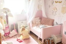 a cute grey and pink girl’s bedroom with a pink Sundvik bed, grey shades, a lamp banner, pink decor and touches and whimsy wallpaper