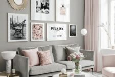 a light-filled living room with grey walls, a grey sofa, light pink chairs and a daybed, pink pillows, a gallery wall and light pink curtains
