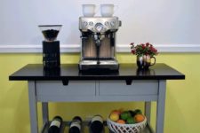 an IKEA Forhoja bar for your home – a cart hacked with grey paint and a black countertop, with all the necessary things