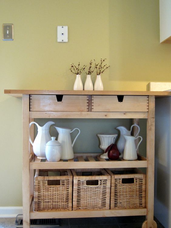 an IKEA Forhoja cart finished with baskets is a cool rustic piece for your home - for storage and not only
