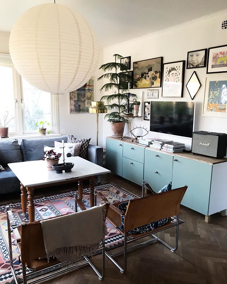 Mixing turquoise doors with wooden countertop is a great way to make your media console stylish (my_habitual_life)