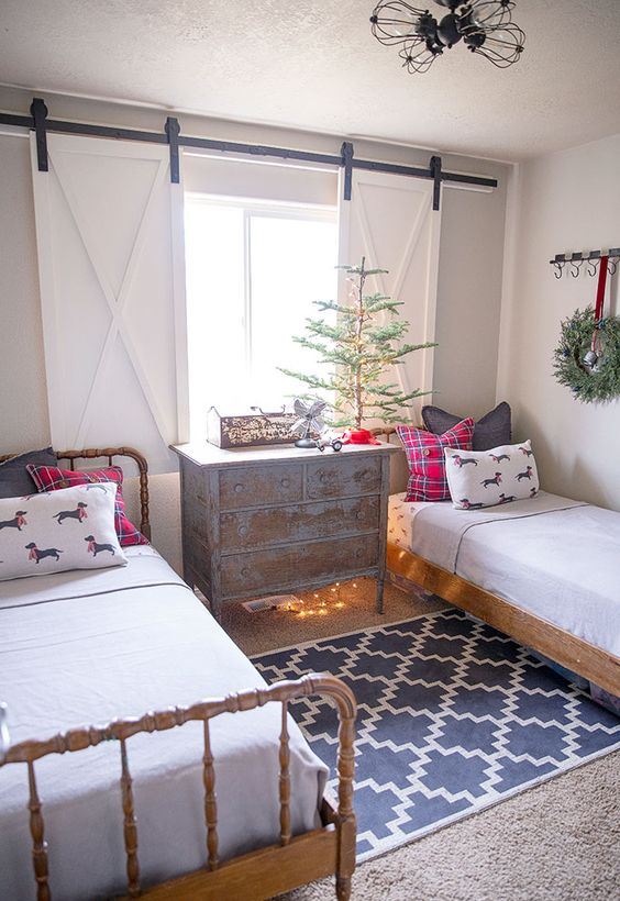 a non-decorated Christmas tree, plaid pillows and some lights for a slight holiday touch in your kids' room