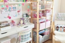 a large open shelf with many boxes and baskets and boxes under the desk for neat organizing