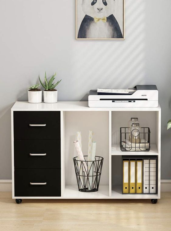 a modern cabinet, partly opened and with drawers is a comfortable piece for storage and it looks trendy