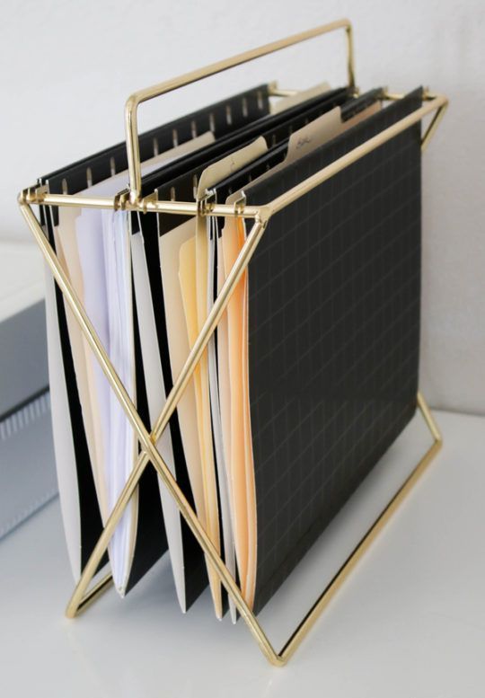 a stylish gold file holder can be placed both on the desk and on the floor and is great for storage
