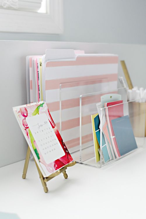 an acrylic file or document organizer is an airy and light idea to bring your papers in order
