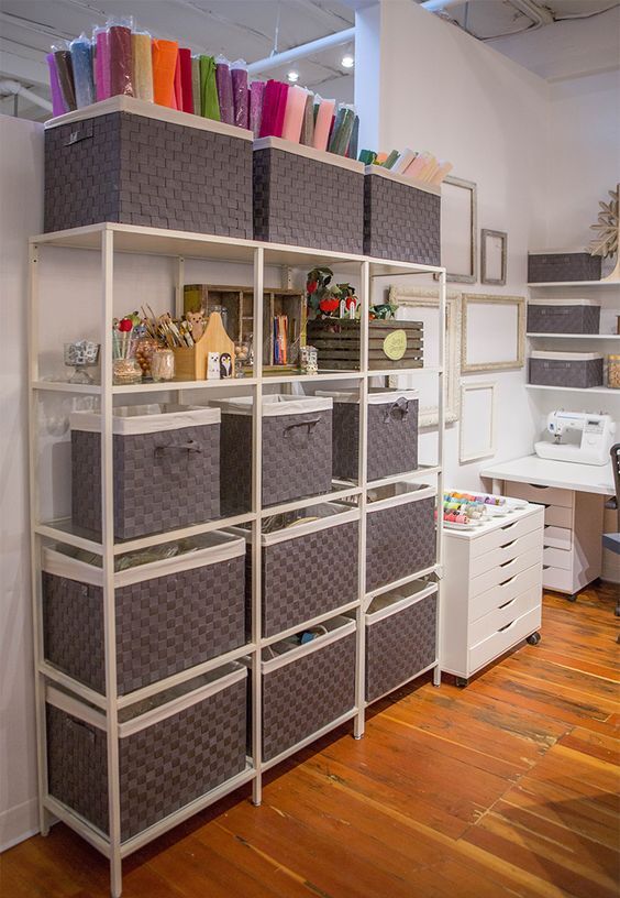an open shelving unit done with simple boxes is a perfect idea that is easy to realize