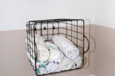 attach wire baskets to the wall and store whatever you like in them