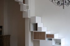 creative contemporary wall and doorway styling with minimalist open and closed shelves running upwards is a cool idea for storage in a whimsy way