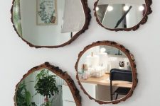 a beautiful and creative arrangement of wood slices with mirrors will be a nice rustic addition to the space, perfect for a rustic or organic room