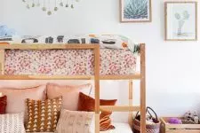a cute girl’s bedroom with nice bedding