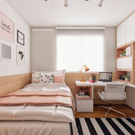a chic well-organized modern teen girl bedroom in neutrals and light pink touches, with built-in furniure and touches of copper
