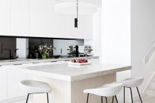 a minimalist kitchen design in b&w tones