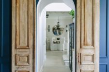 such antique doors made sliding ones add chic and a bold look to the space