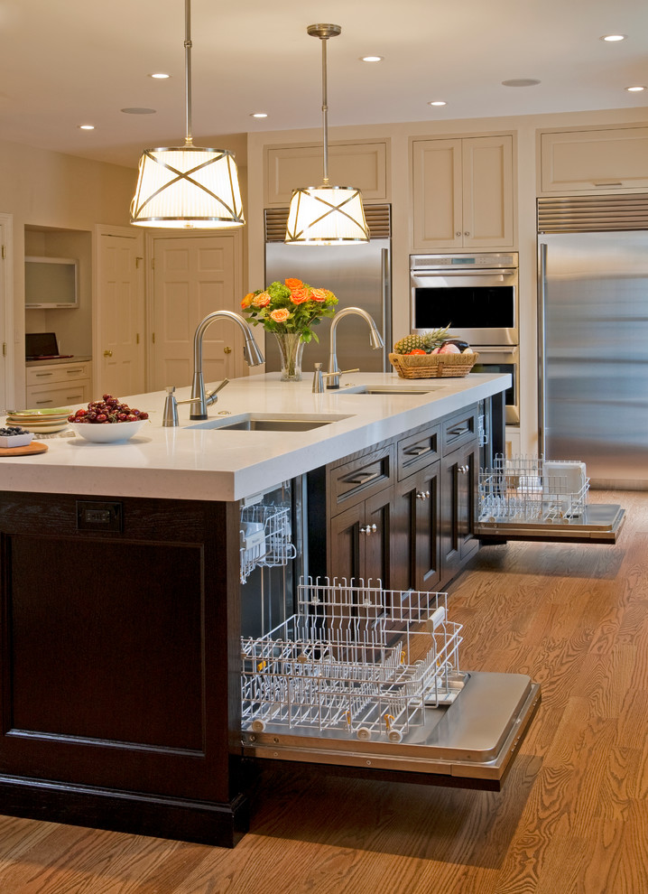 A luxurious kitchen island with two dishwashers at once. (Superior Woodcraft, Inc.)