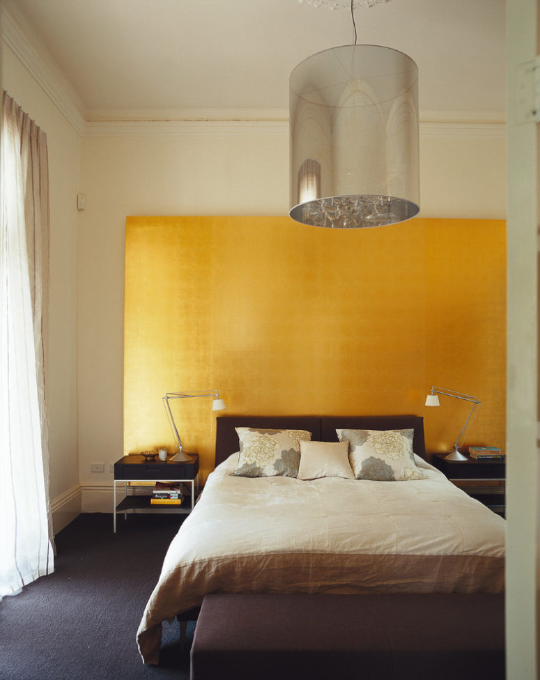 metallic furniture and shiny gold headboard are great for those who doesn't want a bedroom to be moody (Nexus Designs)