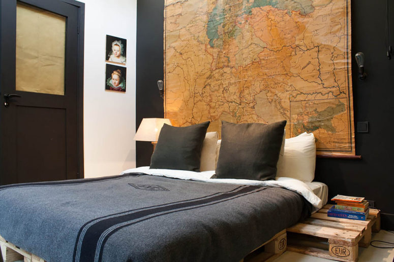 an oversized vintage map could become a gorgeous headboard in a bachelor's pad