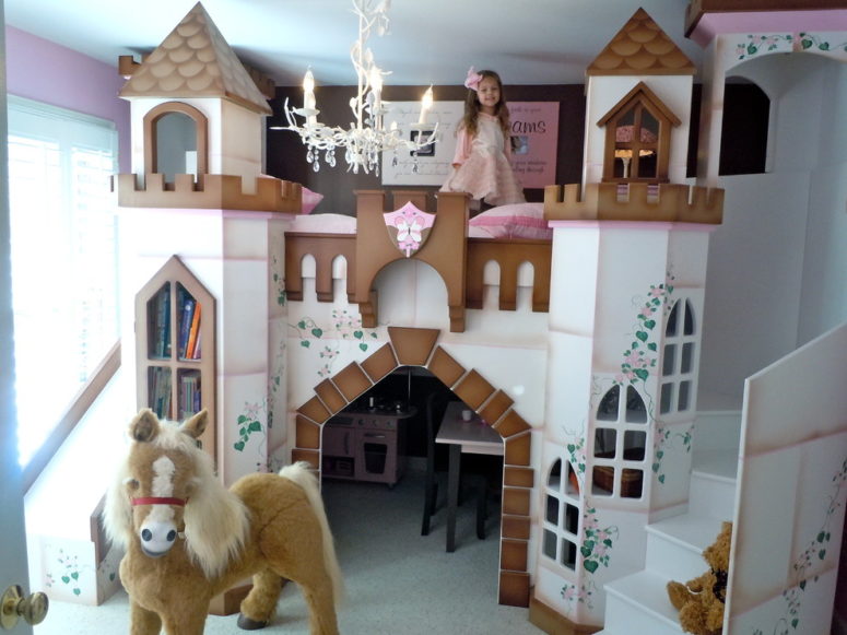A pink and brown house with its own staircase is a luxurious solution for a spacious kids room. (Sweet Retreat Kids)