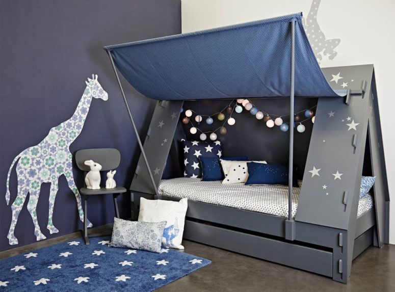 An awesome tent cabin bed in dark grey is perfect for a boy scout or girl guide. Stars are cool and creative touch. The bed is bade from pine and MDF. (Cuckooland)