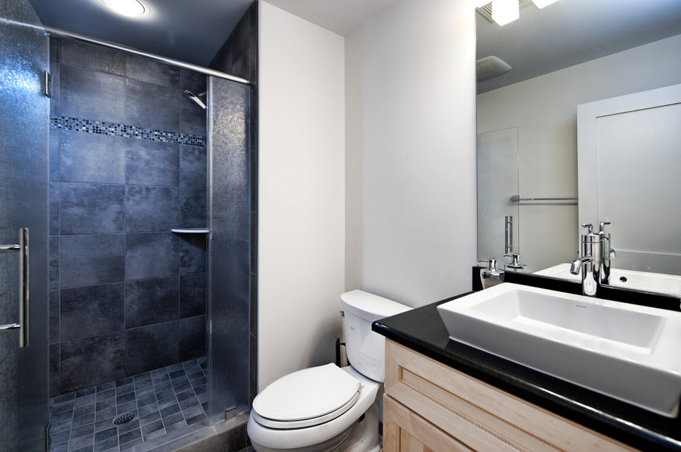 dark tiles are perfect for a walk-in shower but won't work well around the vanity (Moss Building and Design | Moss Home Services)
