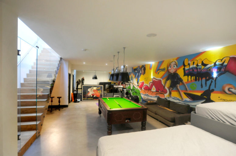 some graffiti would turn any basement into a happy place (Riach Architects)