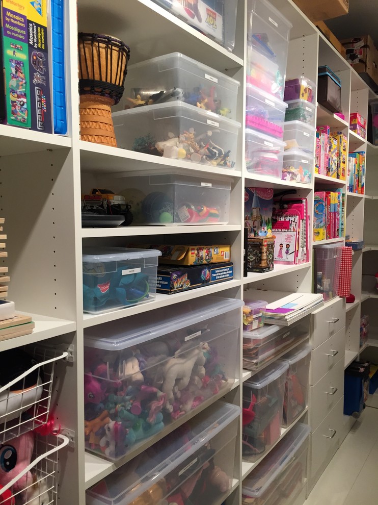 IKEA's plastic boxes serves well when you need to organize stuff on your basement's shelves. You can even skip labeling them. (Organization Made Simple Inc.)