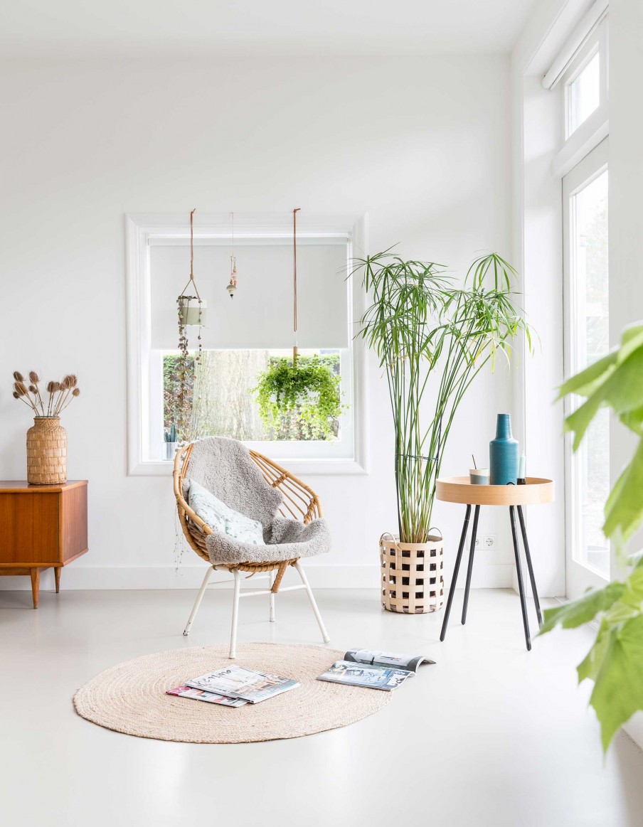 All White Interior Filled With Mid-Century Modern Furniture