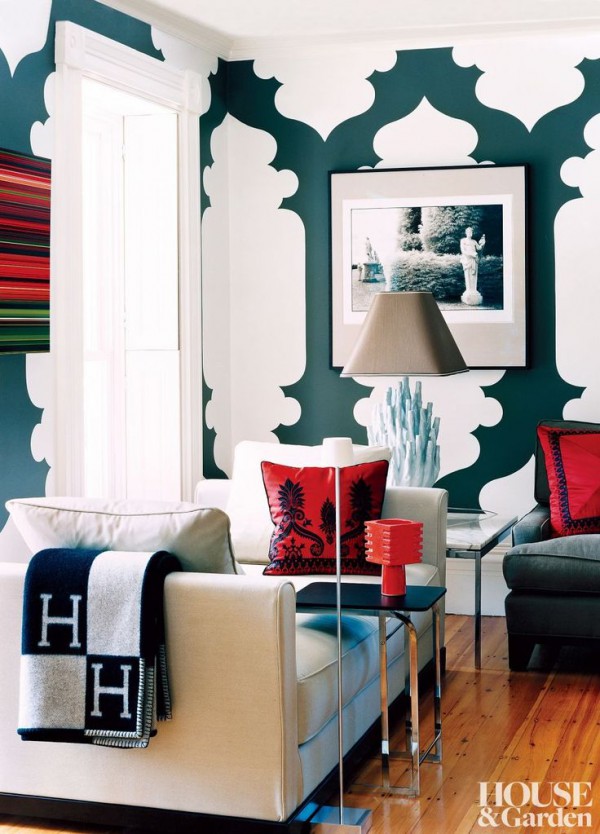 Here the dark green and bright red look great together. White space between patterns balances it out and lightens up the room, which would be very dark if it was painted green entirely.
